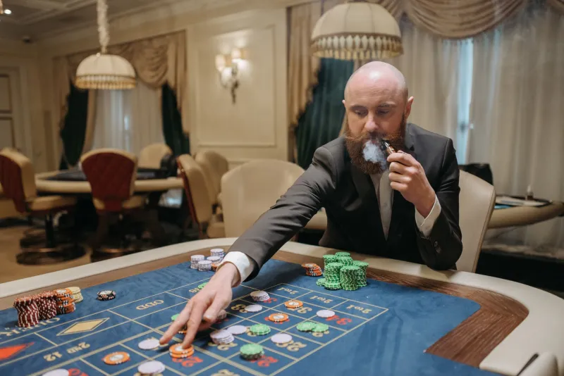 The Art of Manufactured Reality: How Elite Players Weaponize Behavioral Economics to Win Without Superior Cards